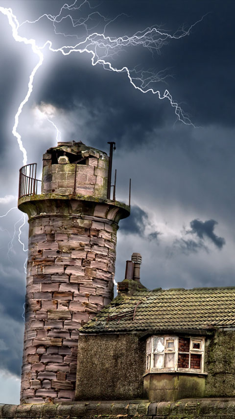 dilapidated lighthouse old building ocean lightning wallpaper background phone